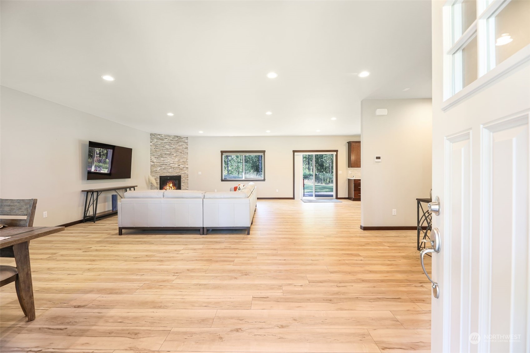 36016 Mann Road Sultan, WA 98294 - Photo 5 of 39 a living room with furniture and a wooden floor