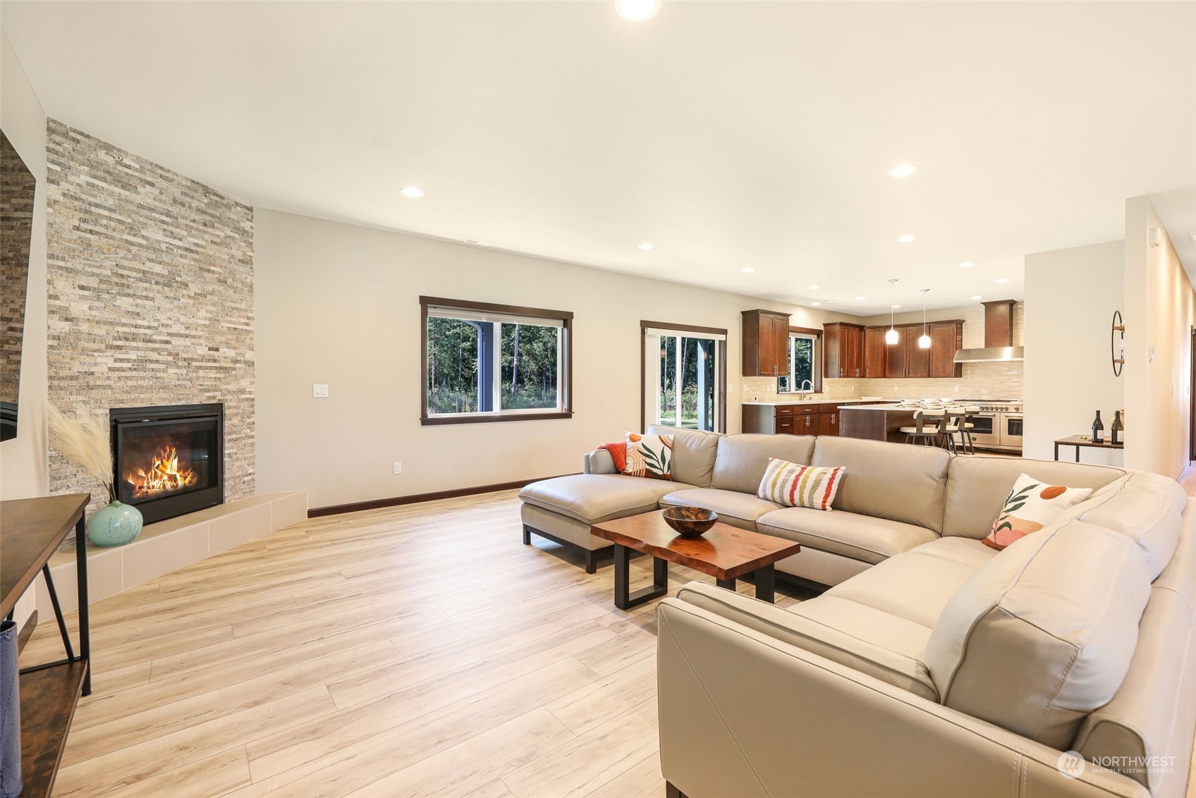 36016 Mann Road Sultan, WA 98294 - Photo 7 of 39 a living room with furniture and a fireplace