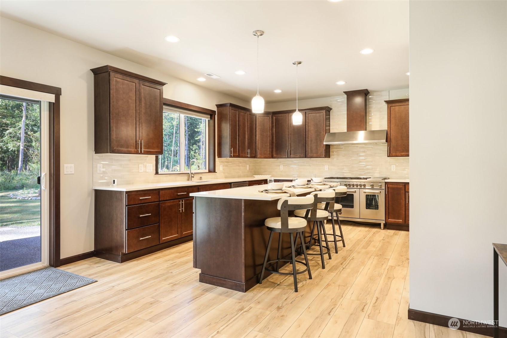 36016 Mann Road Sultan, WA 98294 - Photo 8 of 39 a view of kitchen with sink microwave and dining table