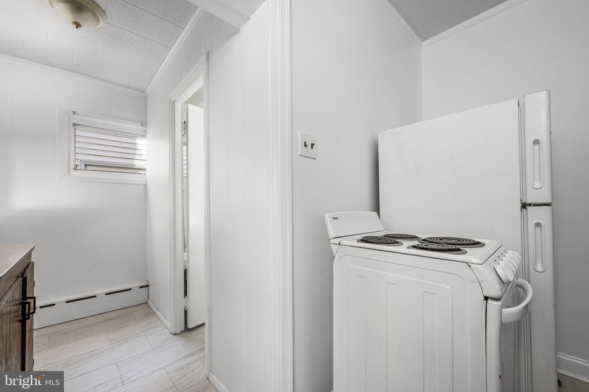 23 East 2nd Street, Unit 1 Pottstown, PA 19464 - Photo 12 of 15 a room with storage and utility