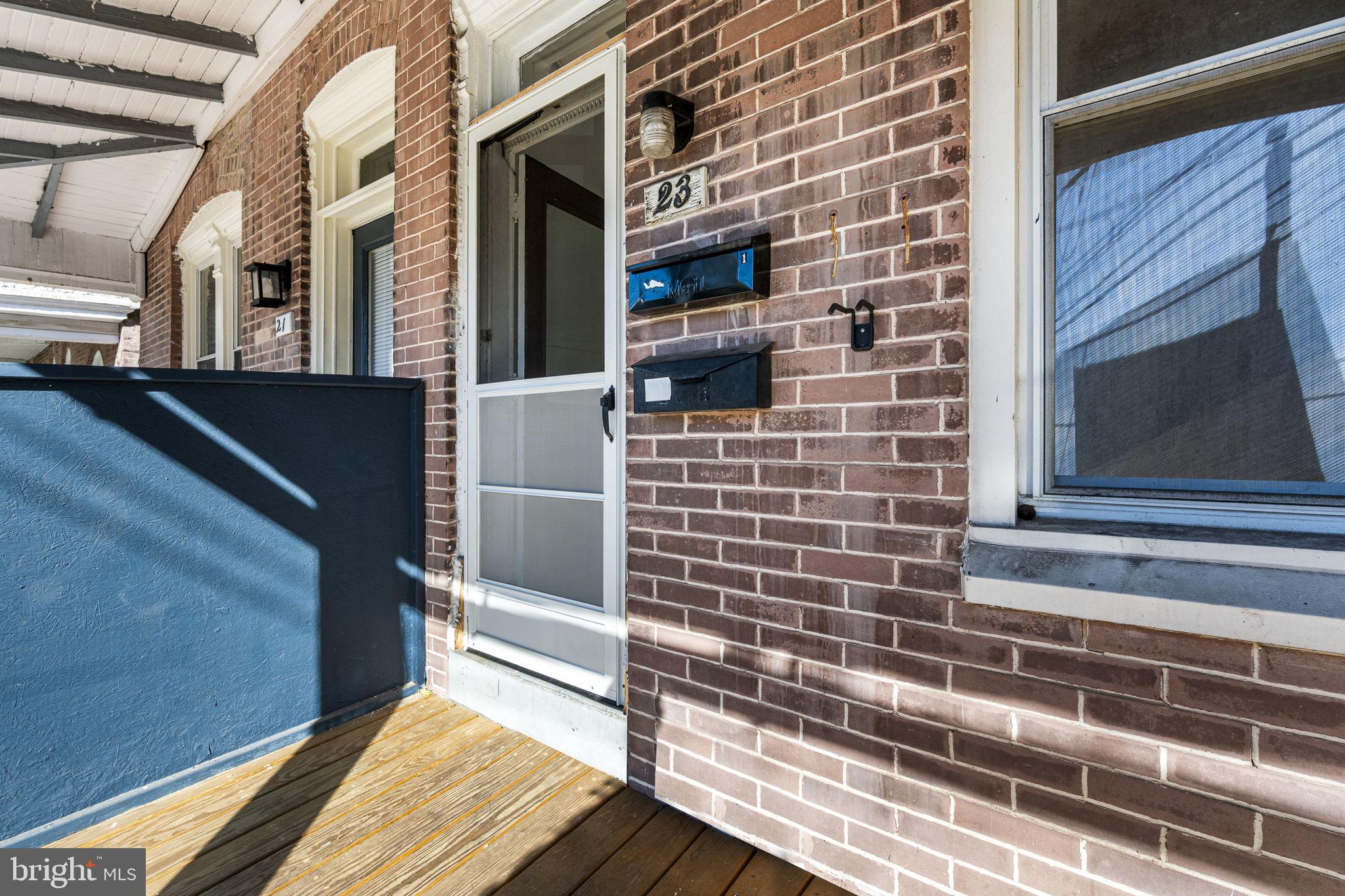 23 East 2nd Street, Unit 1 Pottstown, PA 19464 - Photo 2 of 15 a view of wooden door