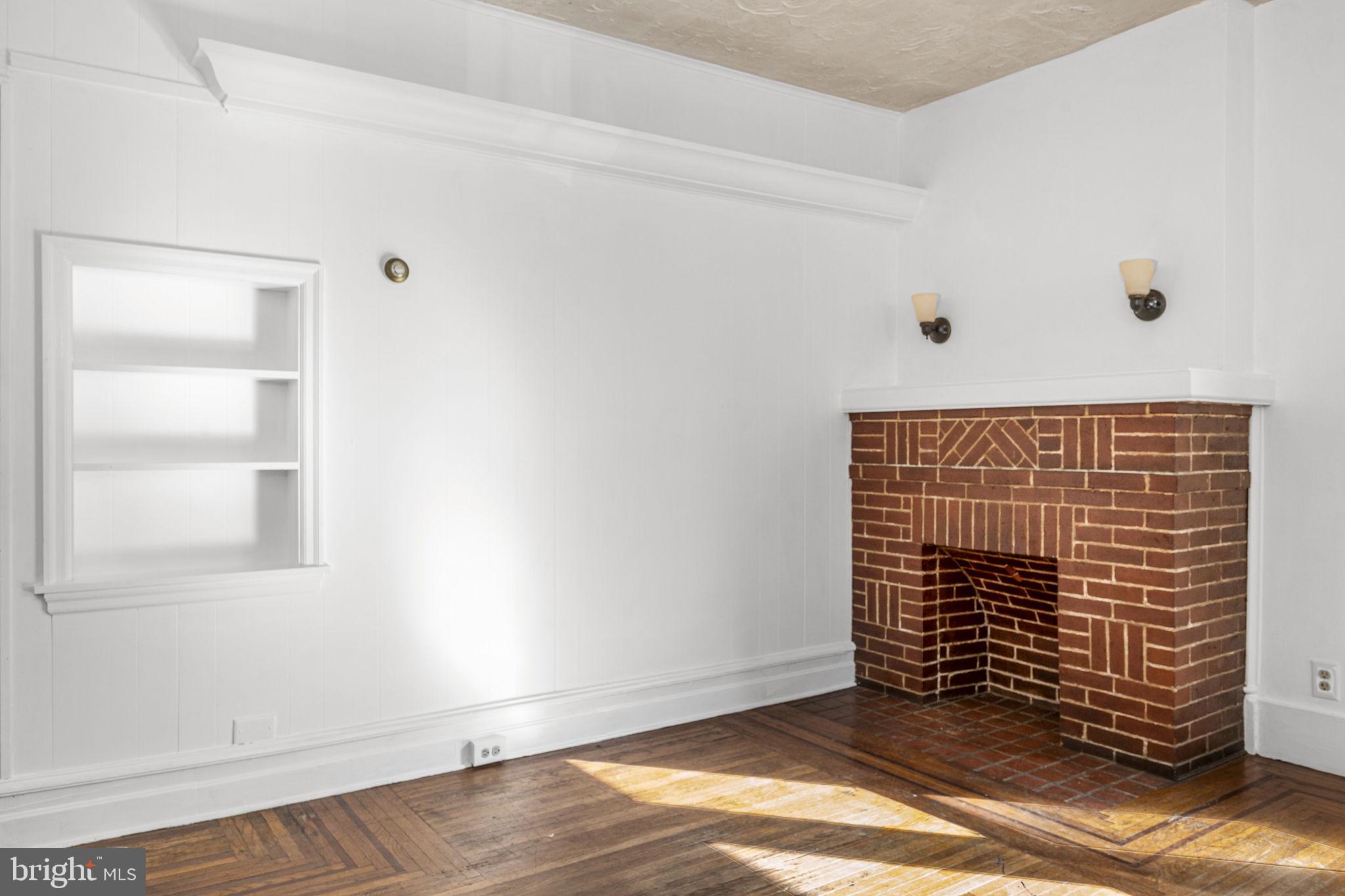 23 East 2nd Street, Unit 1 Pottstown, PA 19464 - Photo 6 of 15 a view of empty room with wooden floor and fan