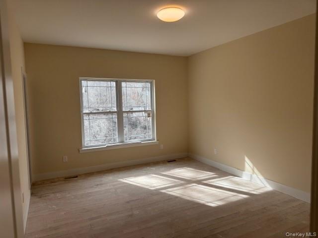 N/c Westfield Lot 0 Rd Coram, NY 11727 - Photo 12 of 29 an empty room with a empty space and a window