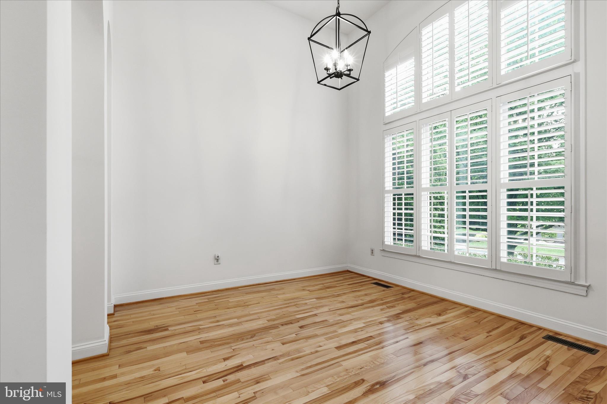 8277 Roxborough Loop Gainesville, VA 20155 - Photo 7 of 84 Dining Room with Custom Plantation Shutters