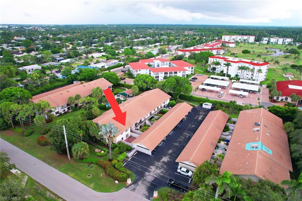3360 10th Street North, Unit 1210 Naples, FL 34103 - Photo 22 of 28 an aerial view of a city