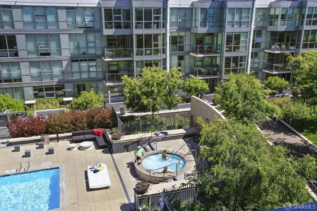 a table and chairs in front of a building