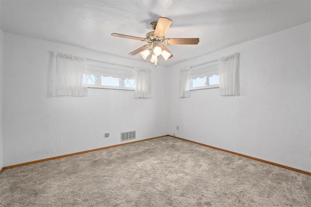 463 1st Street Pittsburgh, PA 15227 - Photo 12 of 20 a view of an empty room with a window