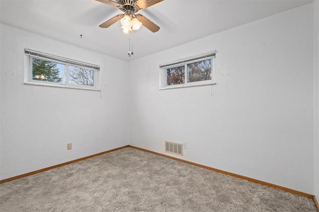 463 1st Street Pittsburgh, PA 15227 - Photo 14 of 20 a view of an empty room with a window