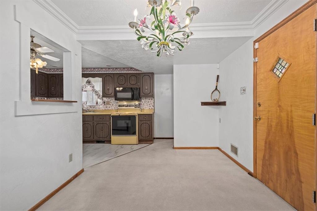 463 1st Street Pittsburgh, PA 15227 - Photo 6 of 20 a view of kitchen with a sink and a refrigerator