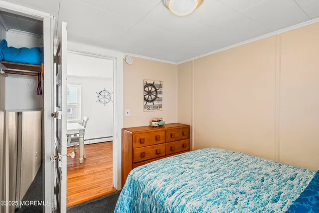 a view of balcony with furniture and umbrella