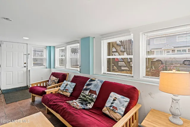 a view of a chairs and table in the patio