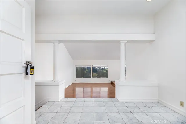 a large white tub sitting in a bathroom