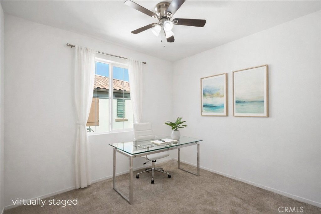 5604 Altamura Way, Unit 10 Fontana, CA 92336 - Photo 15 of 38 a workspace with wooden floor and a window