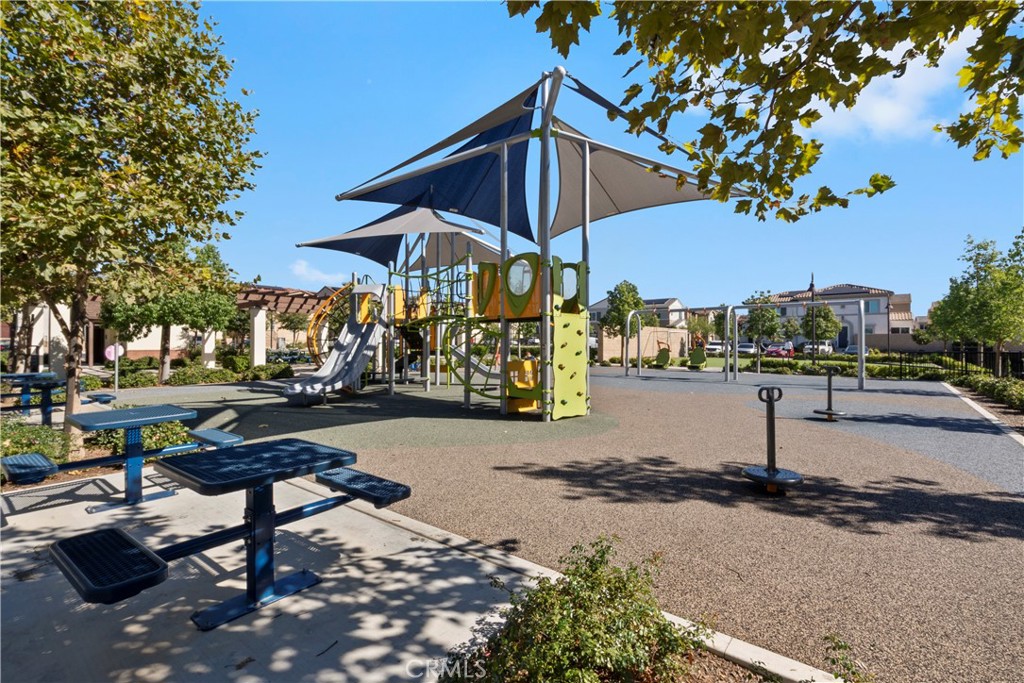 5604 Altamura Way, Unit 10 Fontana, CA 92336 - Photo 27 of 38 a view of a street with sitting area