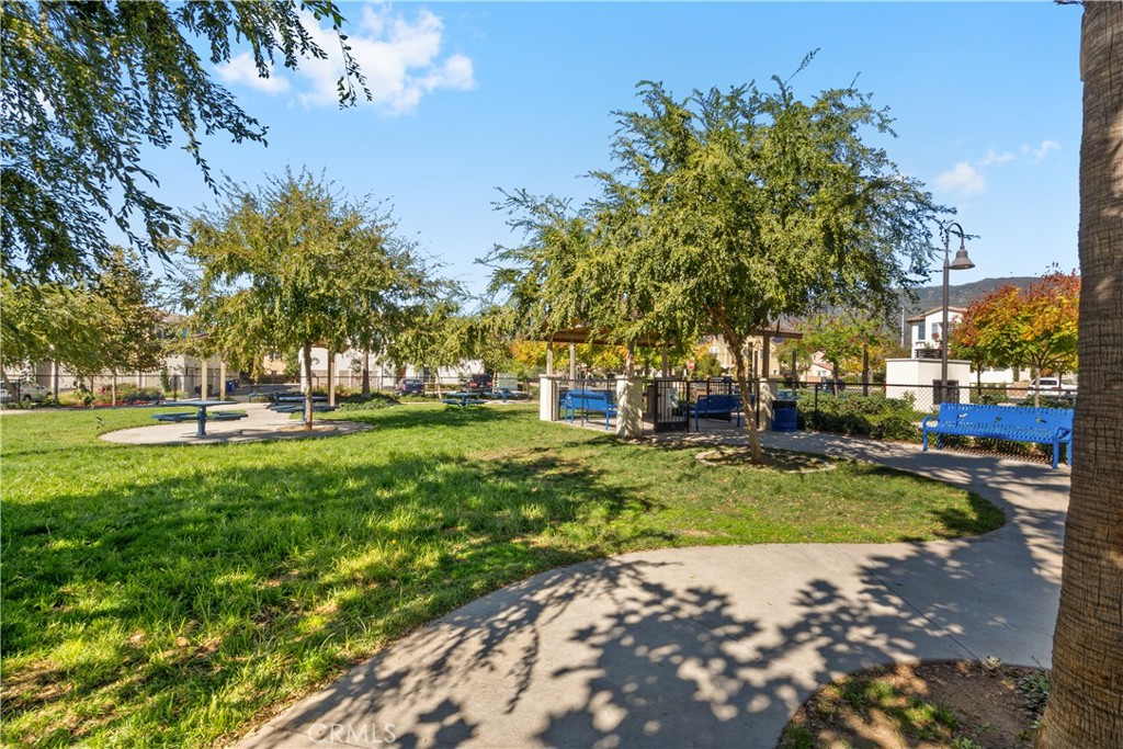 5604 Altamura Way, Unit 10 Fontana, CA 92336 - Photo 28 of 38 a view of a playground with basketball court