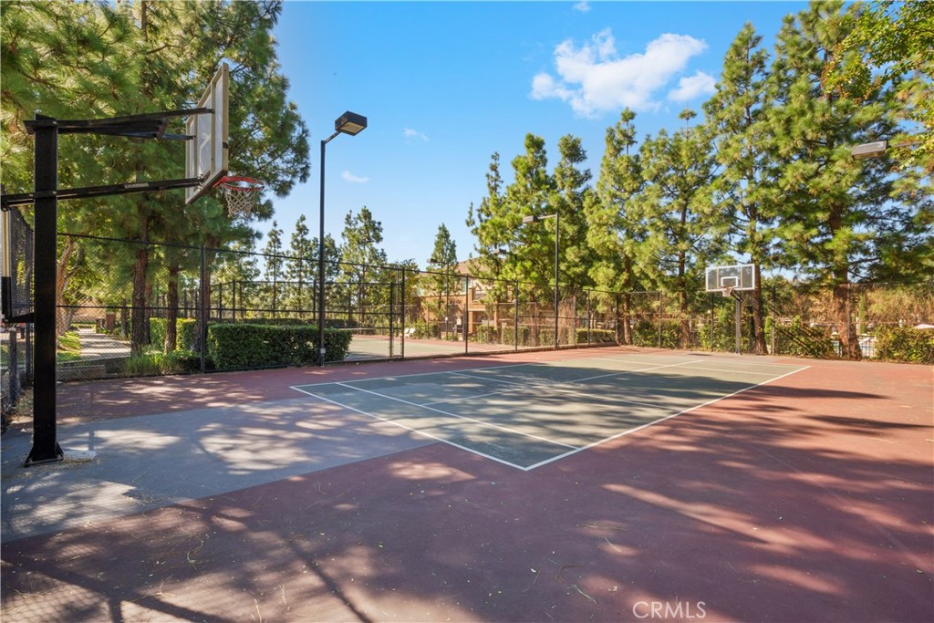5604 Altamura Way, Unit 10 Fontana, CA 92336 - Photo 29 of 38 a view of street along with trees