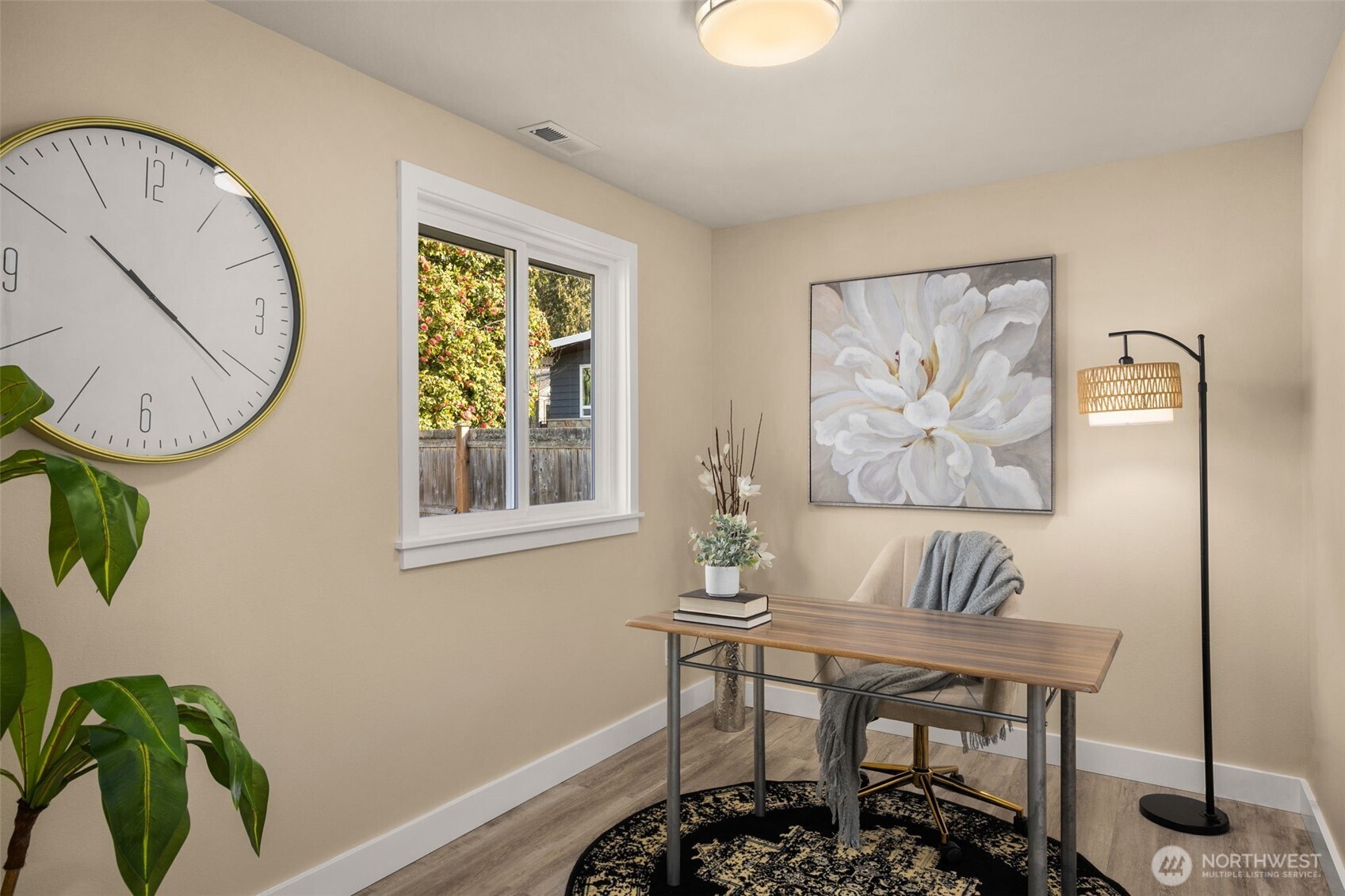 623 Aloha Way Edmonds, WA 98020 - Photo 12 of 28 a view of a dining room with furniture and a window