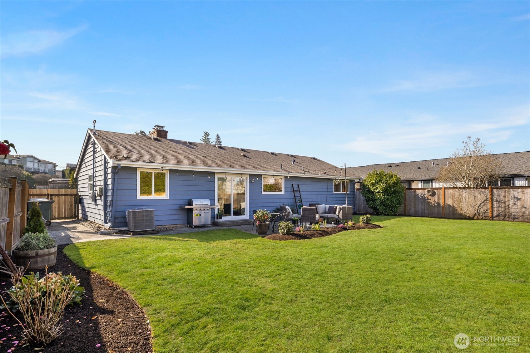 623 Aloha Way Edmonds, WA 98020 - Photo 21 of 28 a view of a house with a big yard and sitting area
