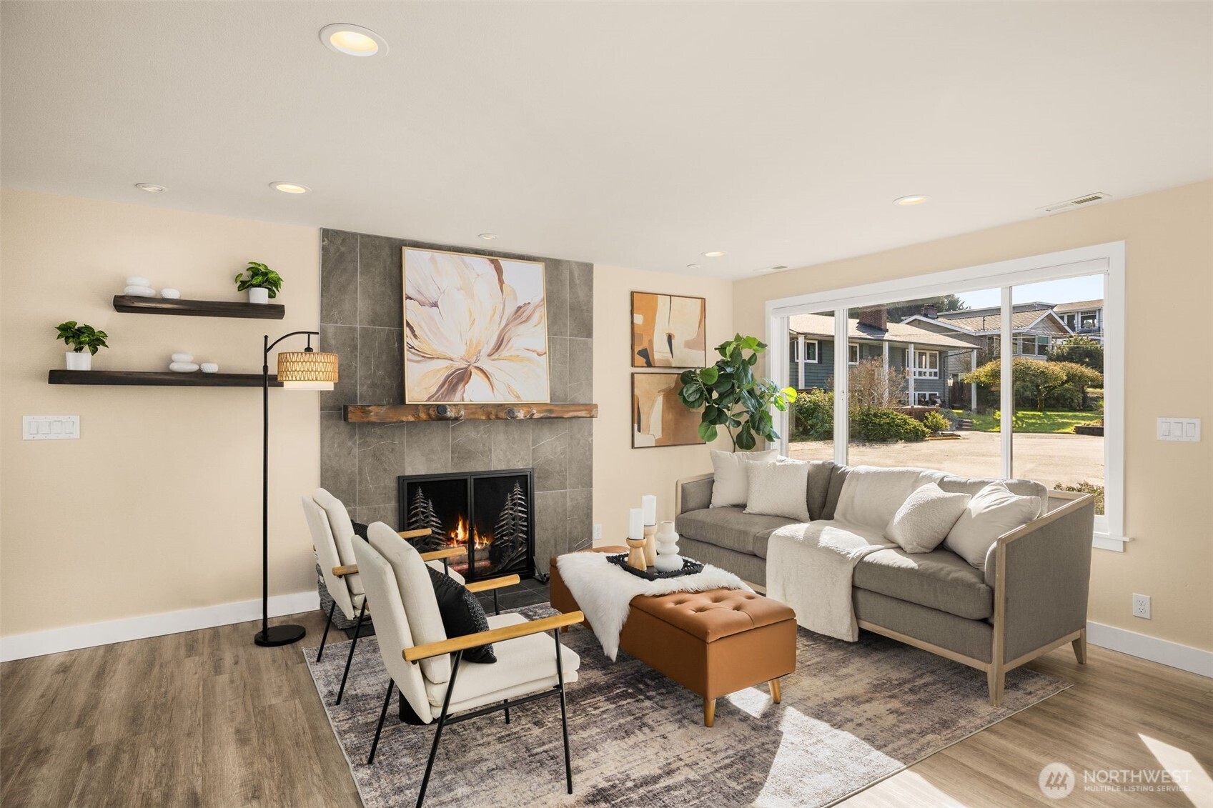 623 Aloha Way Edmonds, WA 98020 - Photo 5 of 28 a living room with furniture and a fireplace