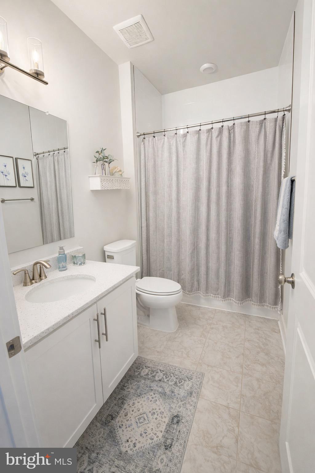 5030 Thornton Way Broad Run, VA 20137 - Photo 12 of 41 a bathroom with a sink toilet and shower