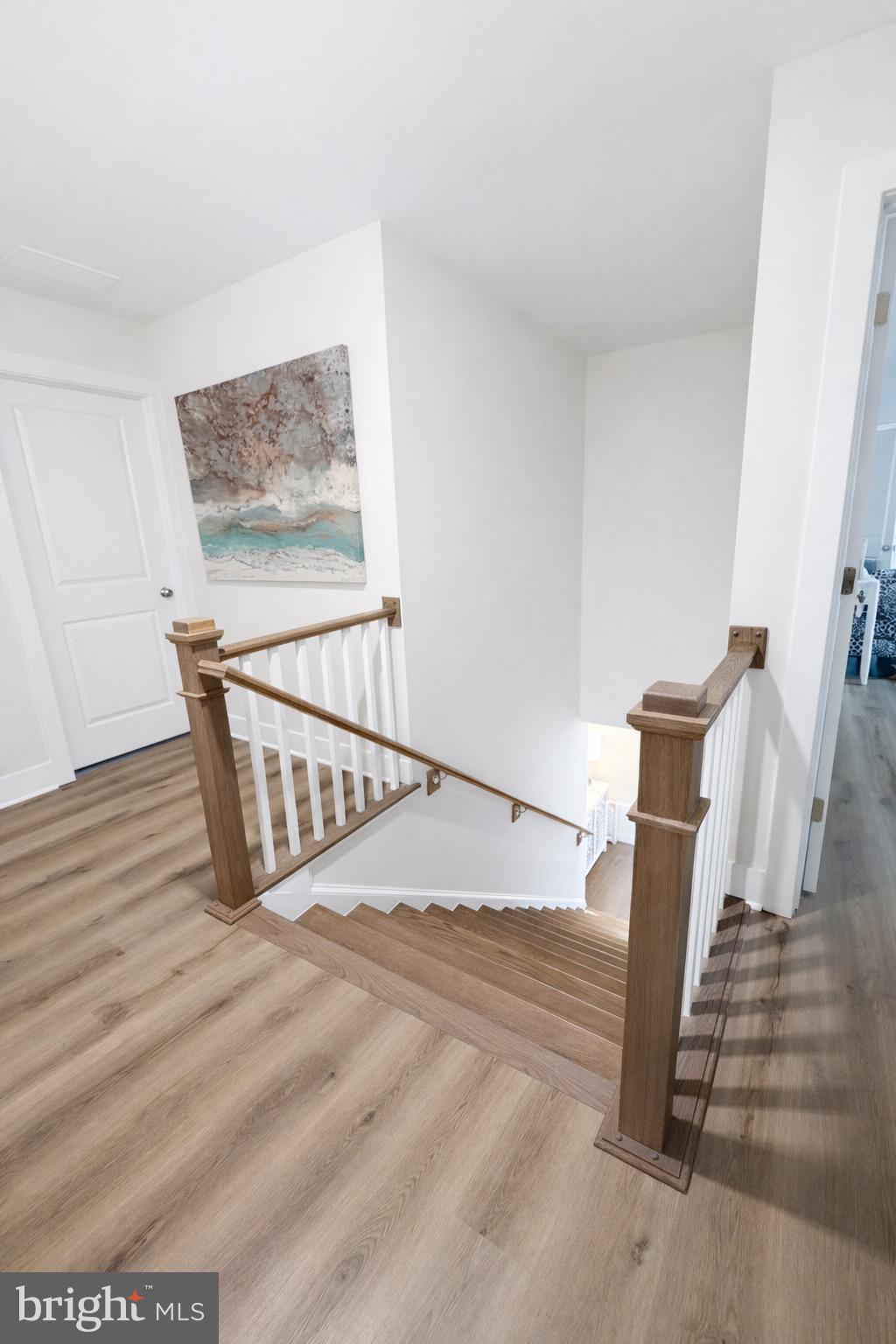 5030 Thornton Way Broad Run, VA 20137 - Photo 18 of 41 a view of staircase with wooden floor