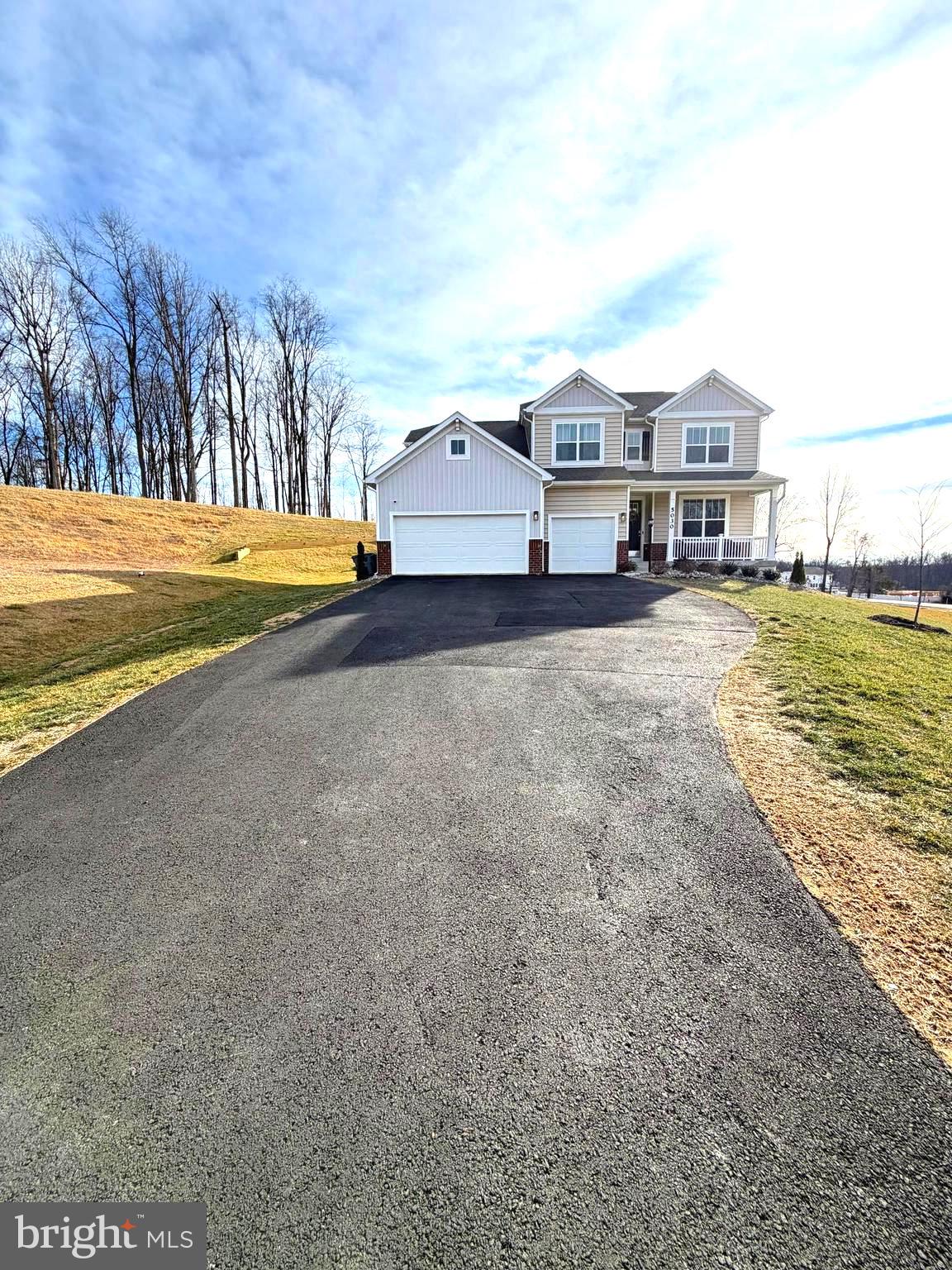 5030 Thornton Way Broad Run, VA 20137 - Photo 2 of 41 a house view with a big yard and large trees