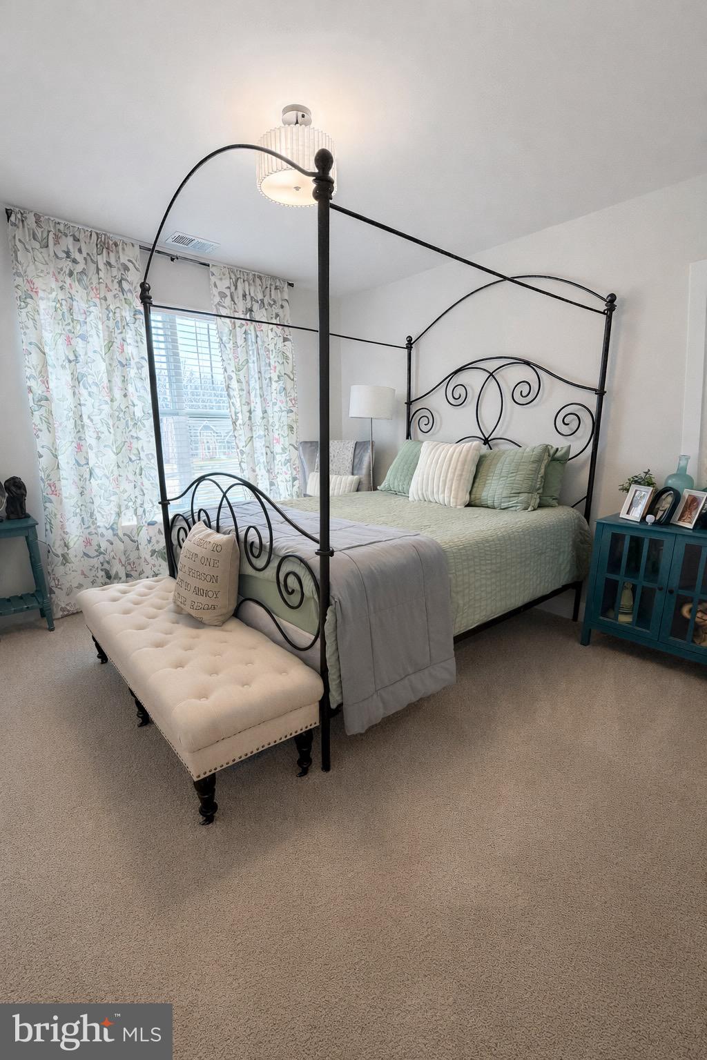 5030 Thornton Way Broad Run, VA 20137 - Photo 25 of 41 a bedroom with bed and a chandelier