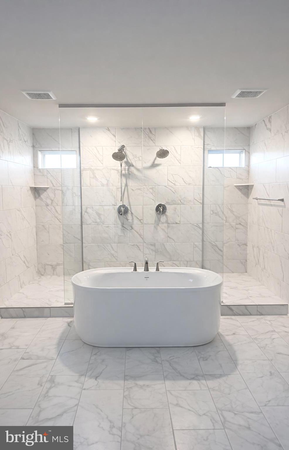 5030 Thornton Way Broad Run, VA 20137 - Photo 31 of 41 a bathroom with a bathtub and shower