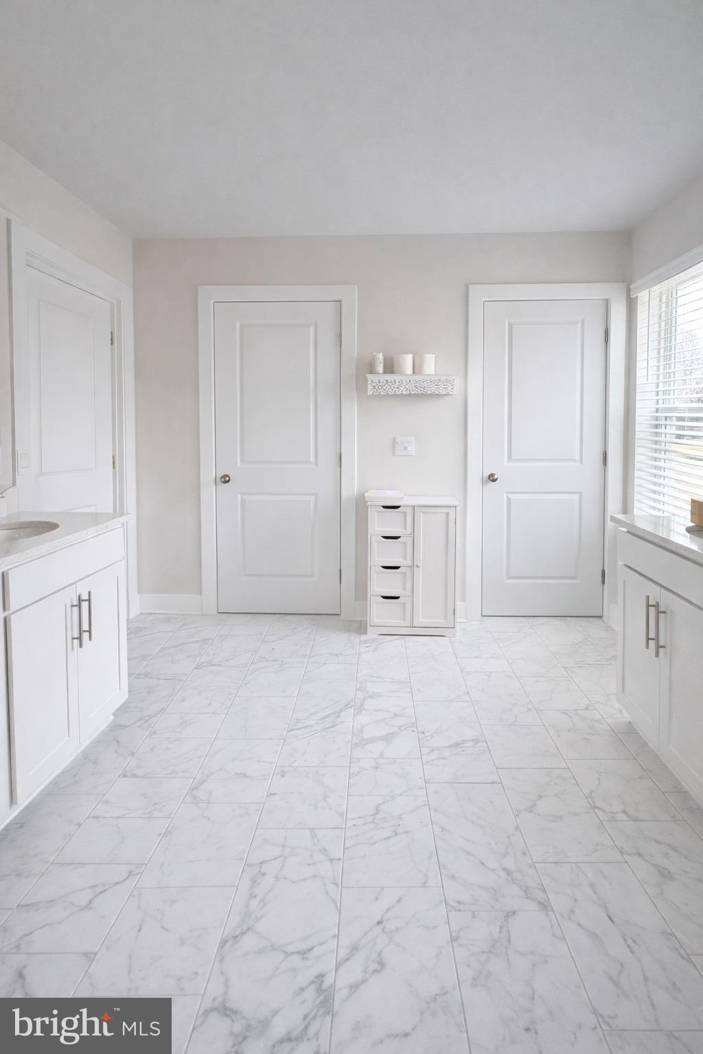 5030 Thornton Way Broad Run, VA 20137 - Photo 32 of 41 a view of empty room with kitchen and window