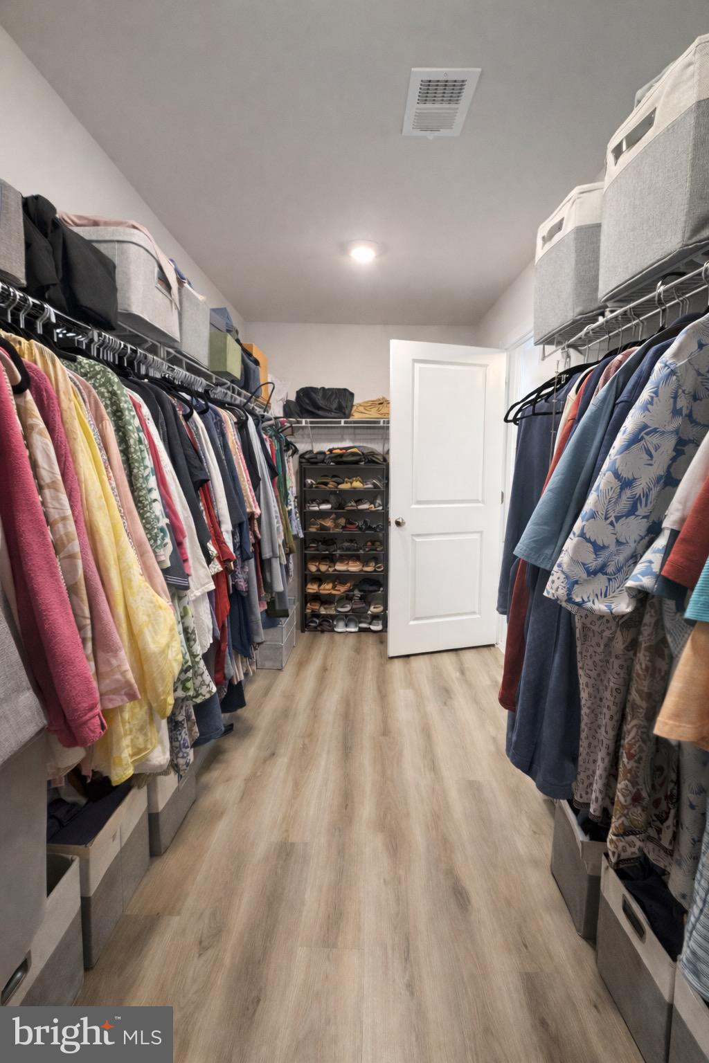 5030 Thornton Way Broad Run, VA 20137 - Photo 33 of 41 a view of walk in closet with clothes and shoes