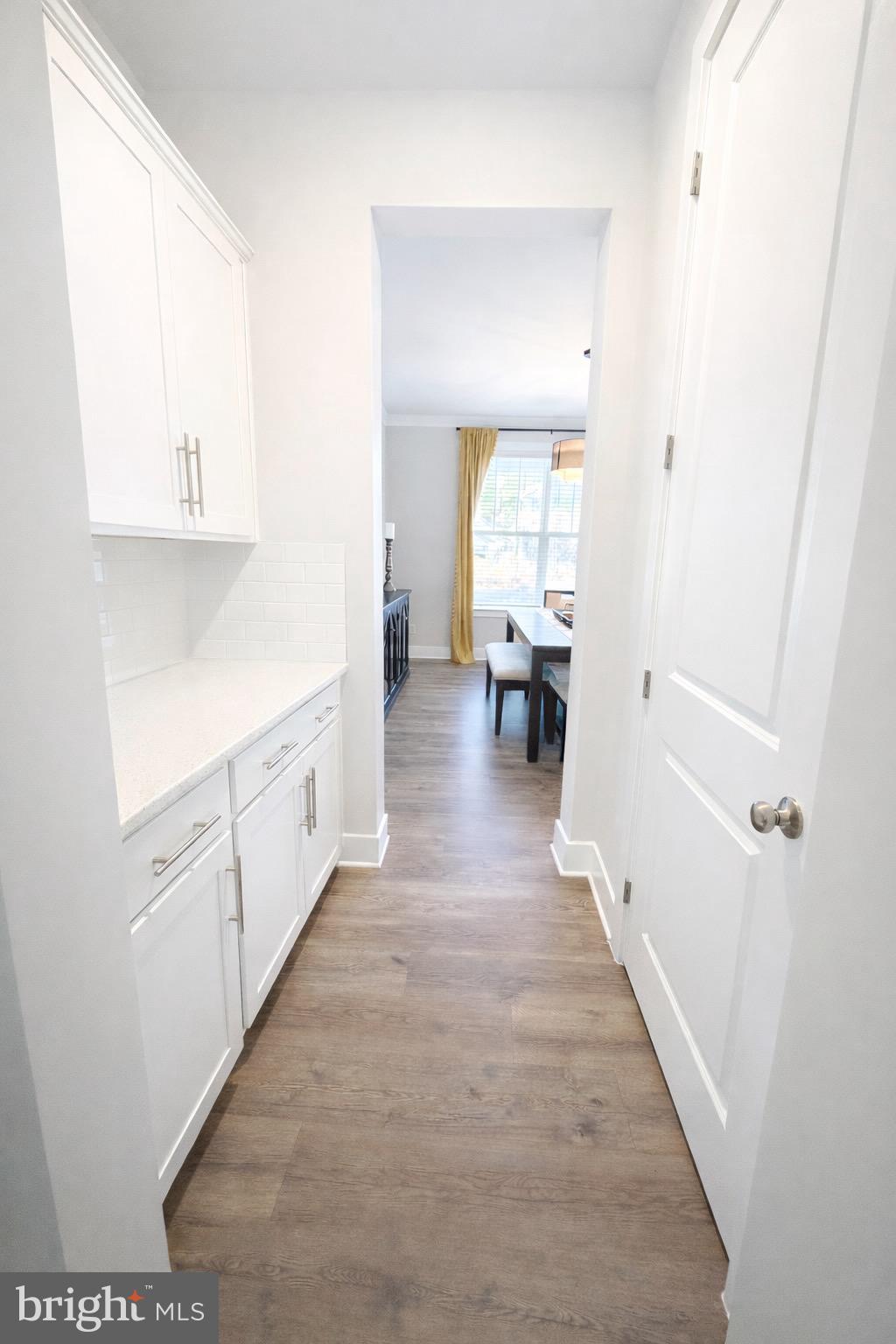 5030 Thornton Way Broad Run, VA 20137 - Photo 6 of 41 a hallway with white cabinets