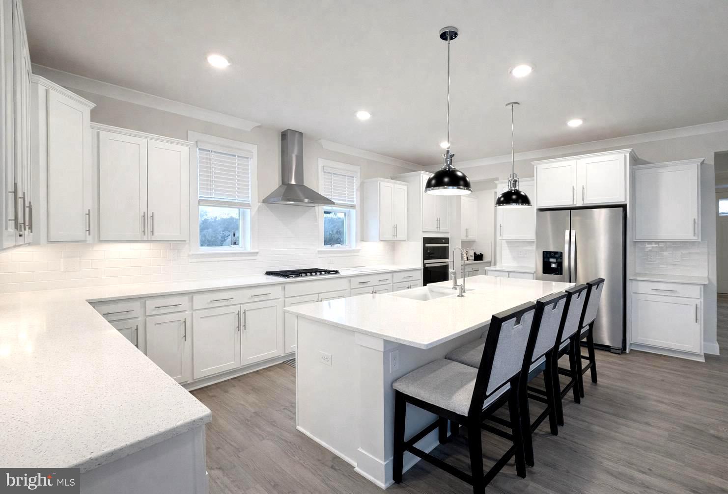 5030 Thornton Way Broad Run, VA 20137 - Photo 7 of 41 a large kitchen with a table and chairs