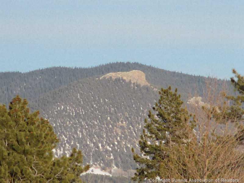 0 Yellowstone Road Hartsel, CO 80449 - Photo 5 of 16 a view of a dry yard with mountains in the background