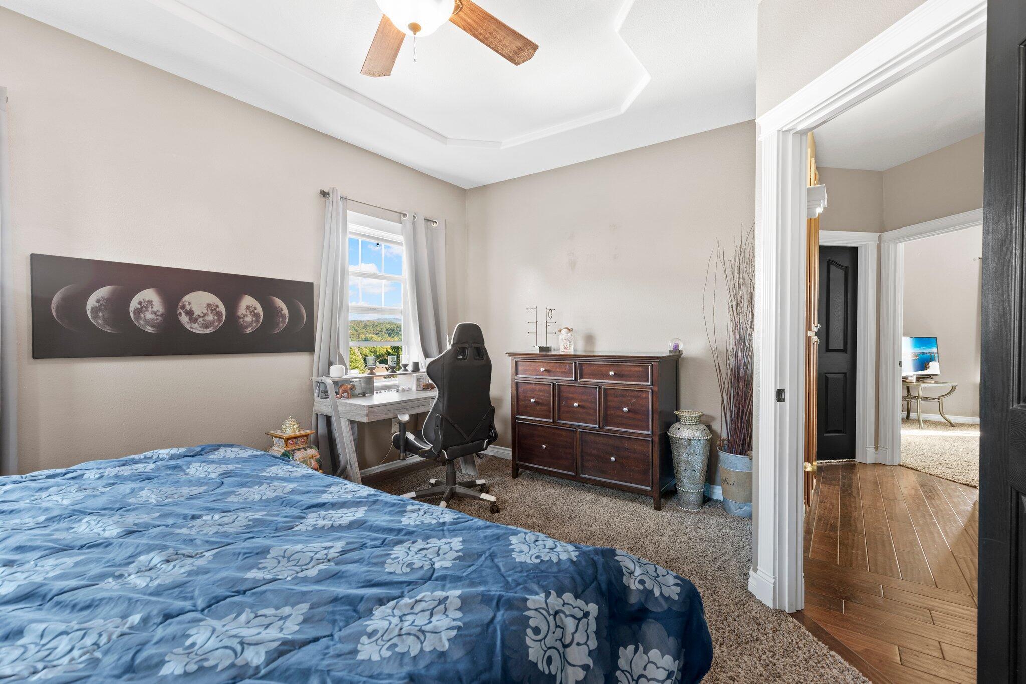 878 Ridgeview Drive Eagle Point, OR 97524 - Photo 23 of 39 a bedroom with a bed and furniture
