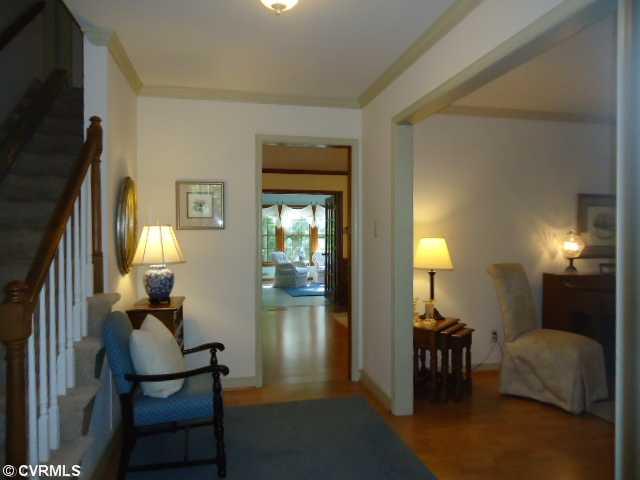1431 Kingscross Road Midlothian, VA 23114 - Photo 3 of 21 Foyer - View from foyer through to the Florida Room.Currently an electric stair-chair is installed on steps to 2nd floor. Owner will convey or remove.