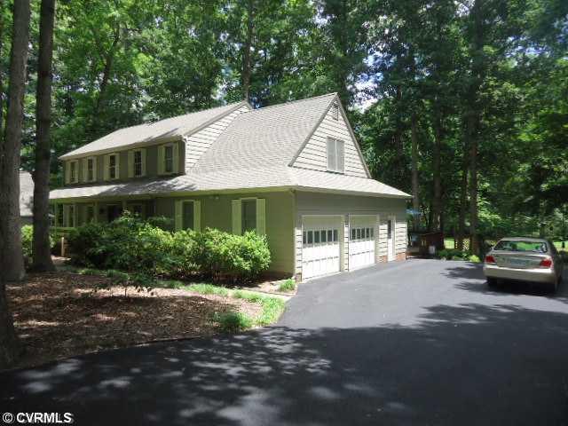 1431 Kingscross Road Midlothian, VA 23114 - Photo 21 of 21 Exterior Front - Note separate garage overhead doors, entry door, and large parking area. Driveway has just been renovated and re-surfaced.