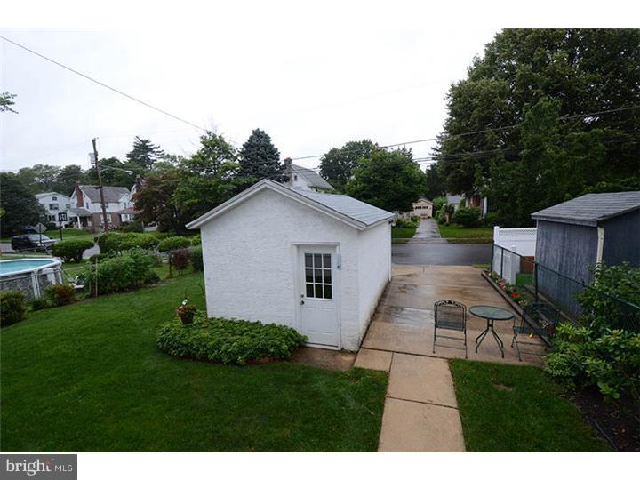 332 East Manoa Road Havertown, PA 19083 - Photo 14 of 14 a backyard of a house with lots of green space