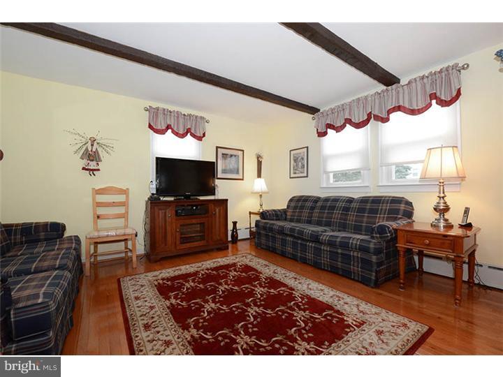 332 East Manoa Road Havertown, PA 19083 - Photo 7 of 14 a bedroom with furniture and a flat screen tv