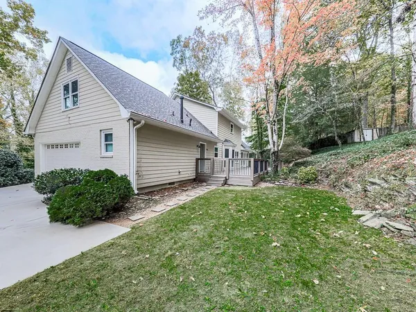 a view of backyard with garden and plants