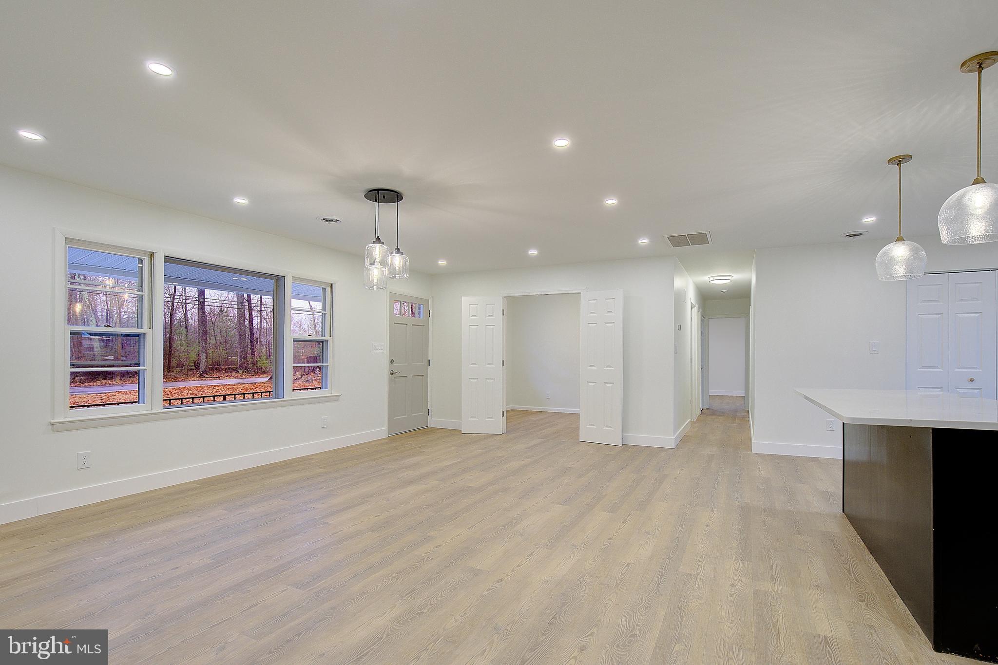 5823 Deale Beach Road Deale, MD 20751 - Photo 4 of 15 a view of an empty room with furniture and window