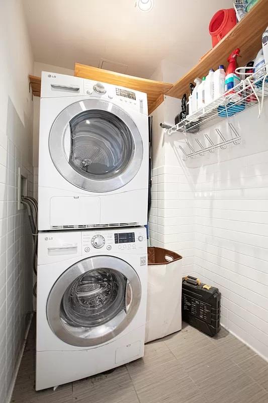 362 St Nicholas Avenue, Unit 9A Manhattan, NY 10027 - Photo 9 of 12 a utility room with dryer and washer
