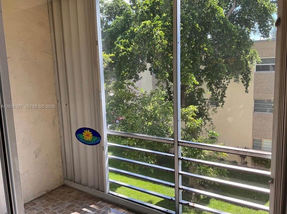 151 Berkley Road, Unit 303 Hollywood, FL 33024 - Photo 11 of 11 a view of outdoor space and deck