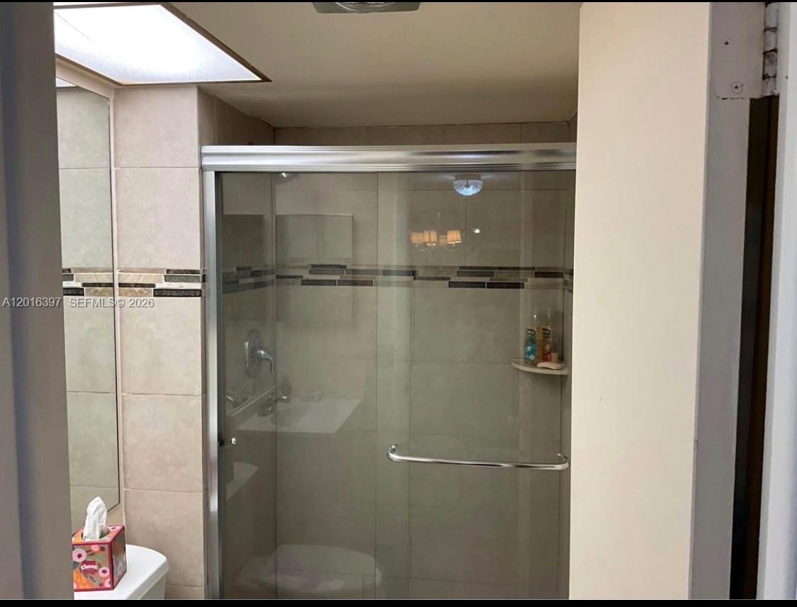 151 Berkley Road, Unit 303 Hollywood, FL 33024 - Photo 10 of 11 a close view of a bathroom shower
