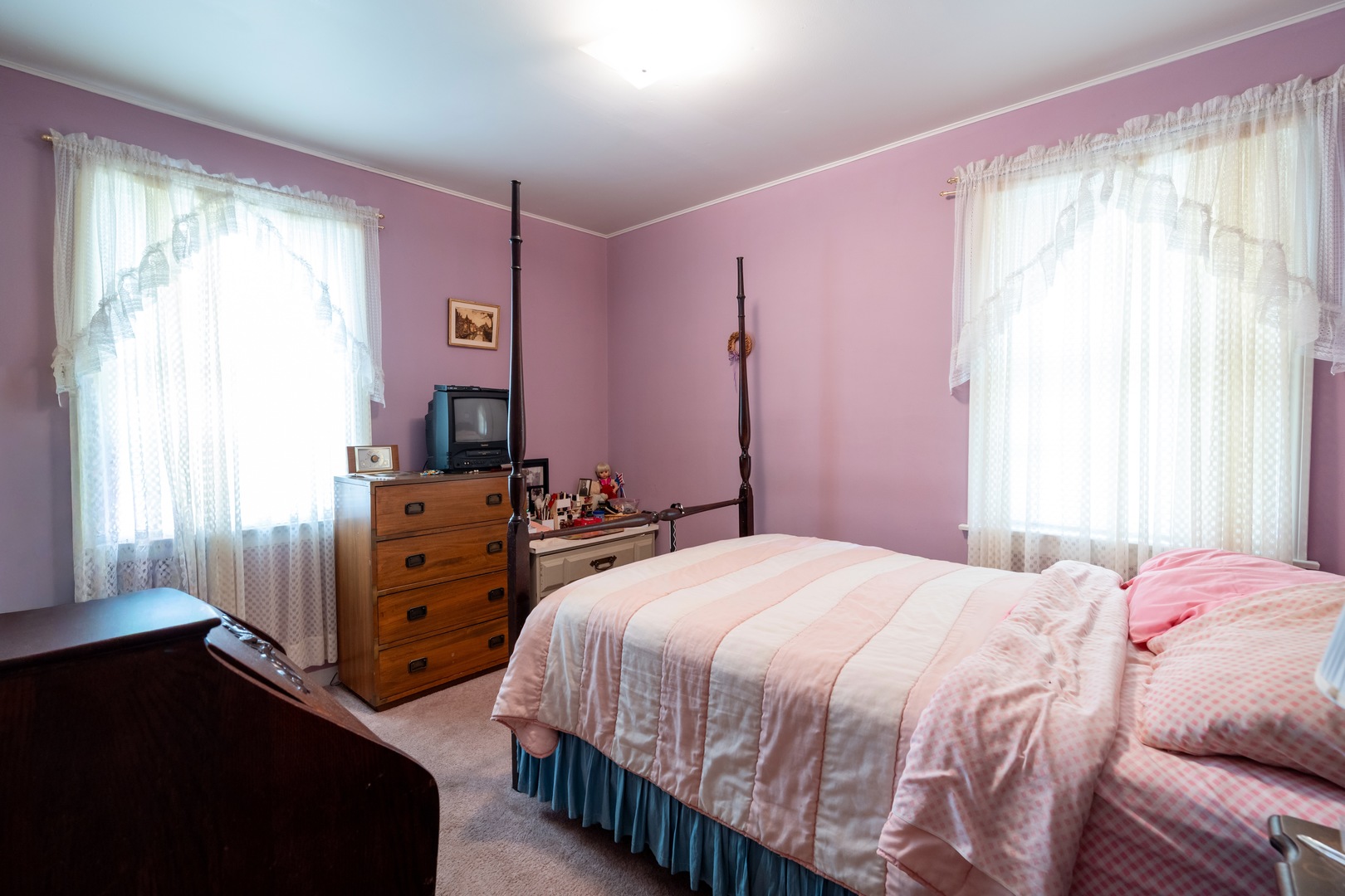 1744 Wesley Avenue Evanston, IL 60201 - Photo 14 of 31 a bedroom with a bed and a dresser