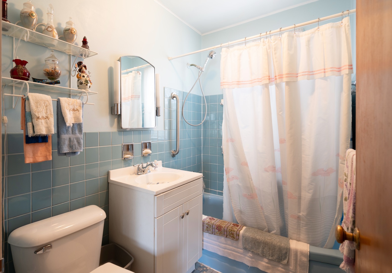 1744 Wesley Avenue Evanston, IL 60201 - Photo 16 of 31 a bathroom with a sink toilet and shower