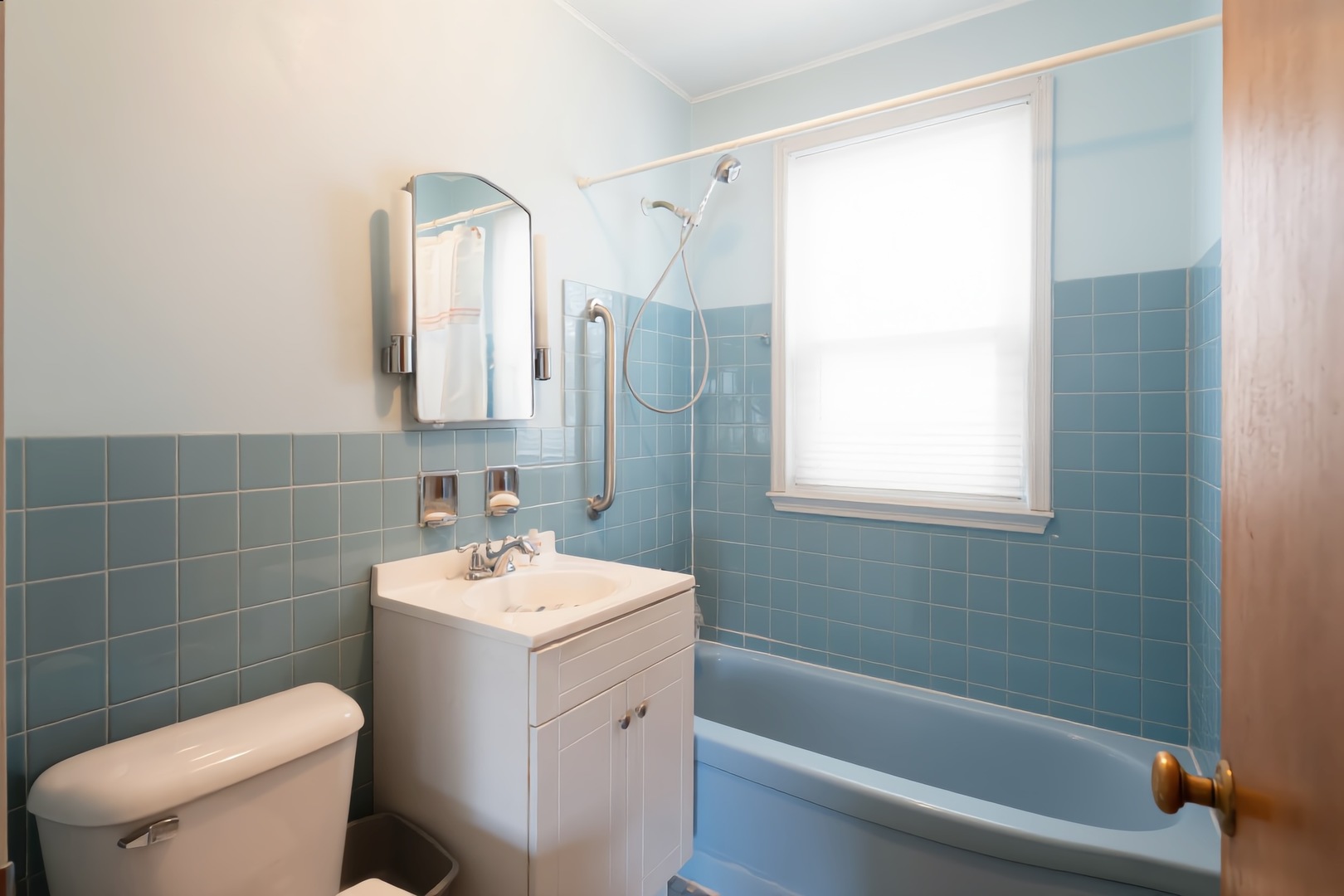 1744 Wesley Avenue Evanston, IL 60201 - Photo 17 of 31 a bathroom with a sink toilet and shower