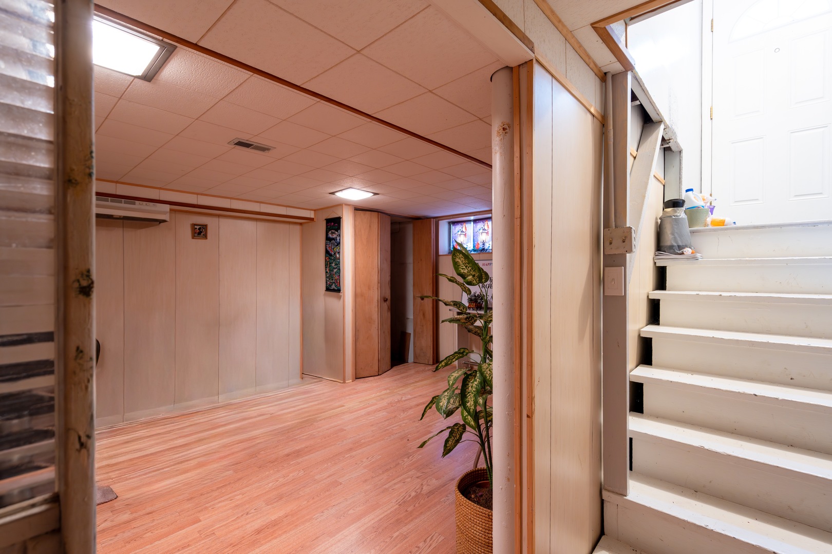1744 Wesley Avenue Evanston, IL 60201 - Photo 29 of 31 a view of entryway with wooden floor and stairs