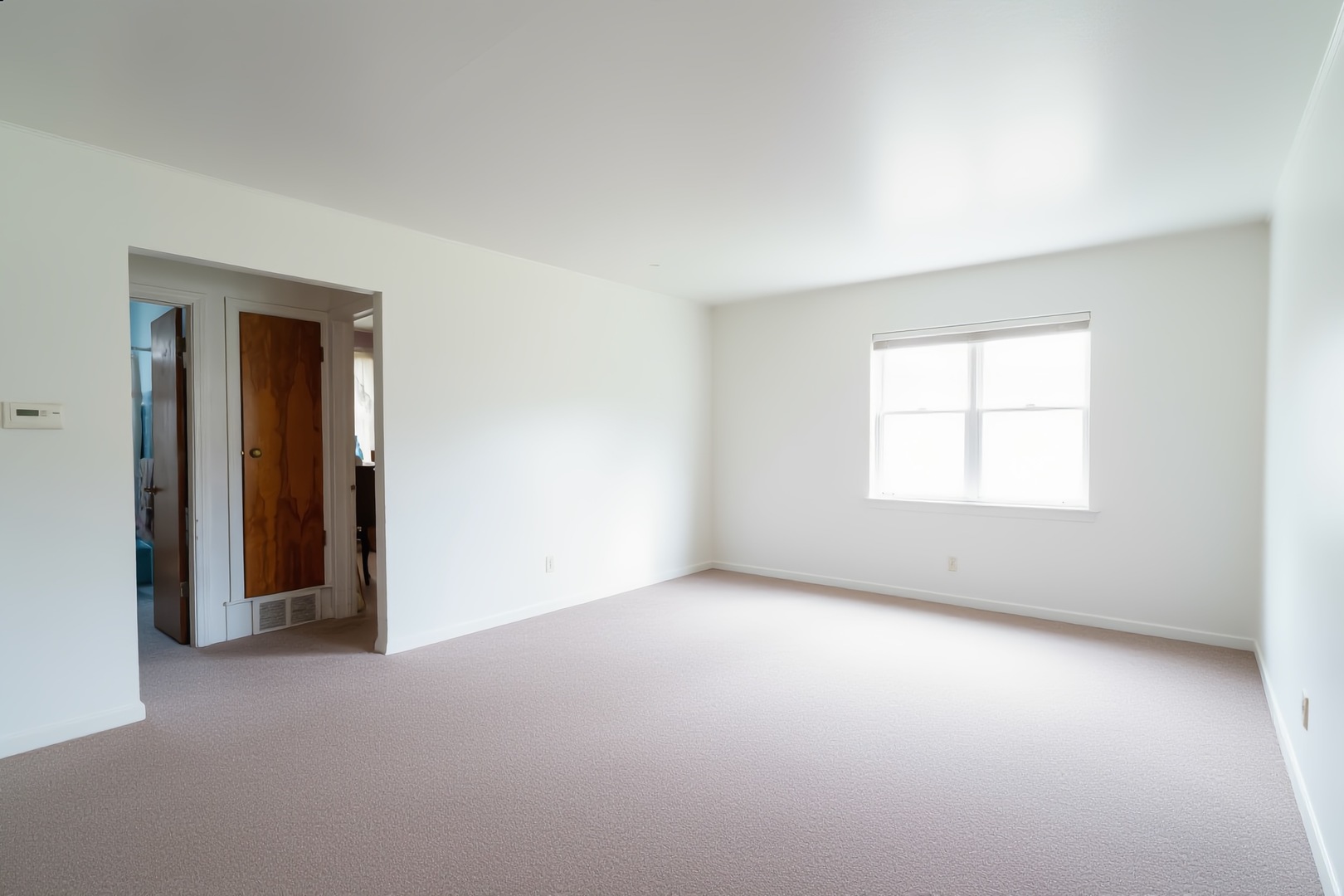 1744 Wesley Avenue Evanston, IL 60201 - Photo 5 of 31 an empty room with windows and closet