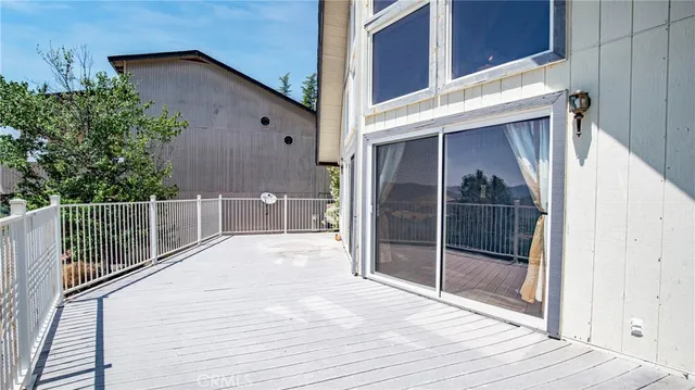 a view of a balcony with stairs