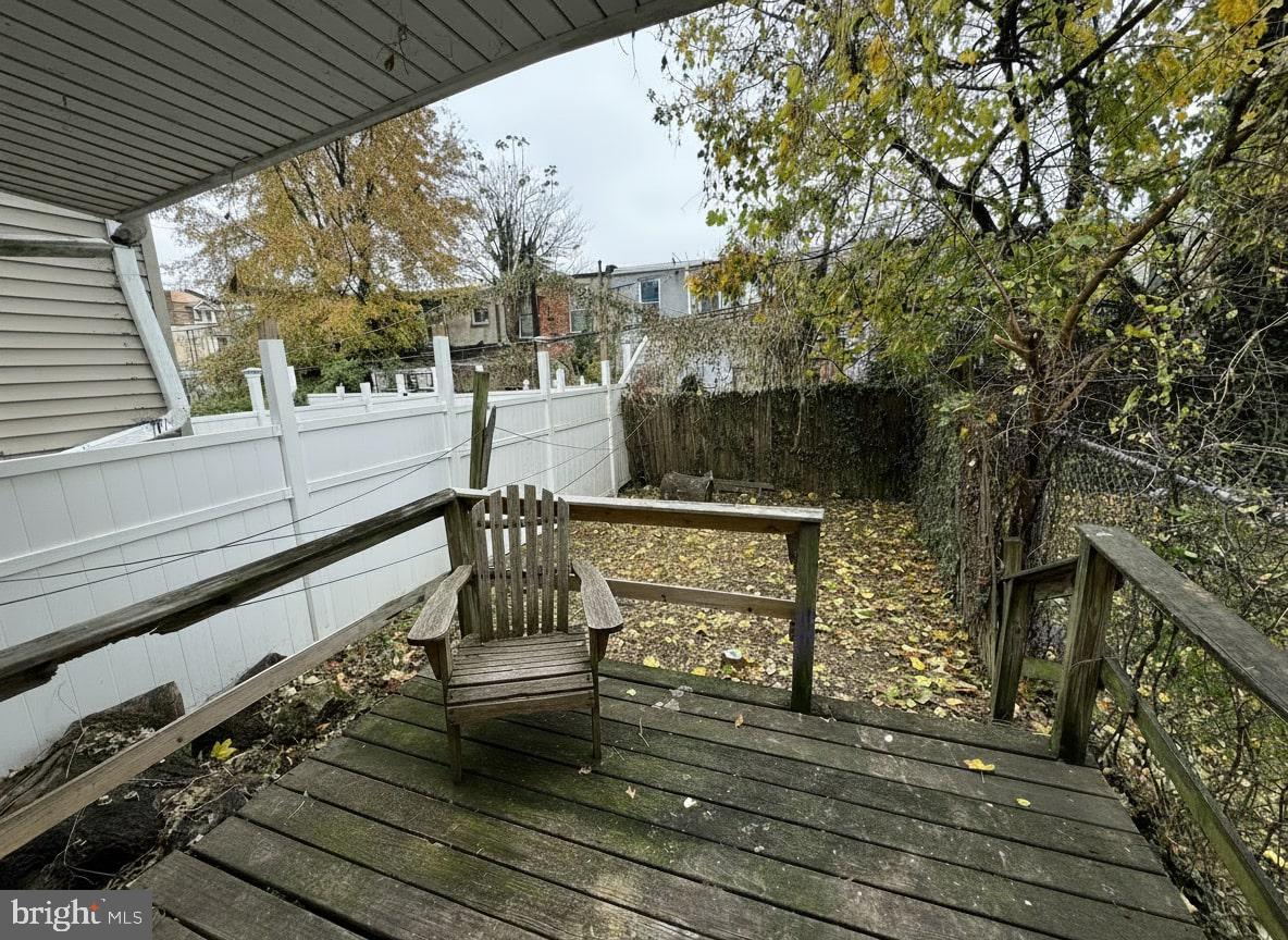 70 East Walnut Lane Philadelphia, PA 19144 - Photo 11 of 11 a view of balcony with wooden floor and bench